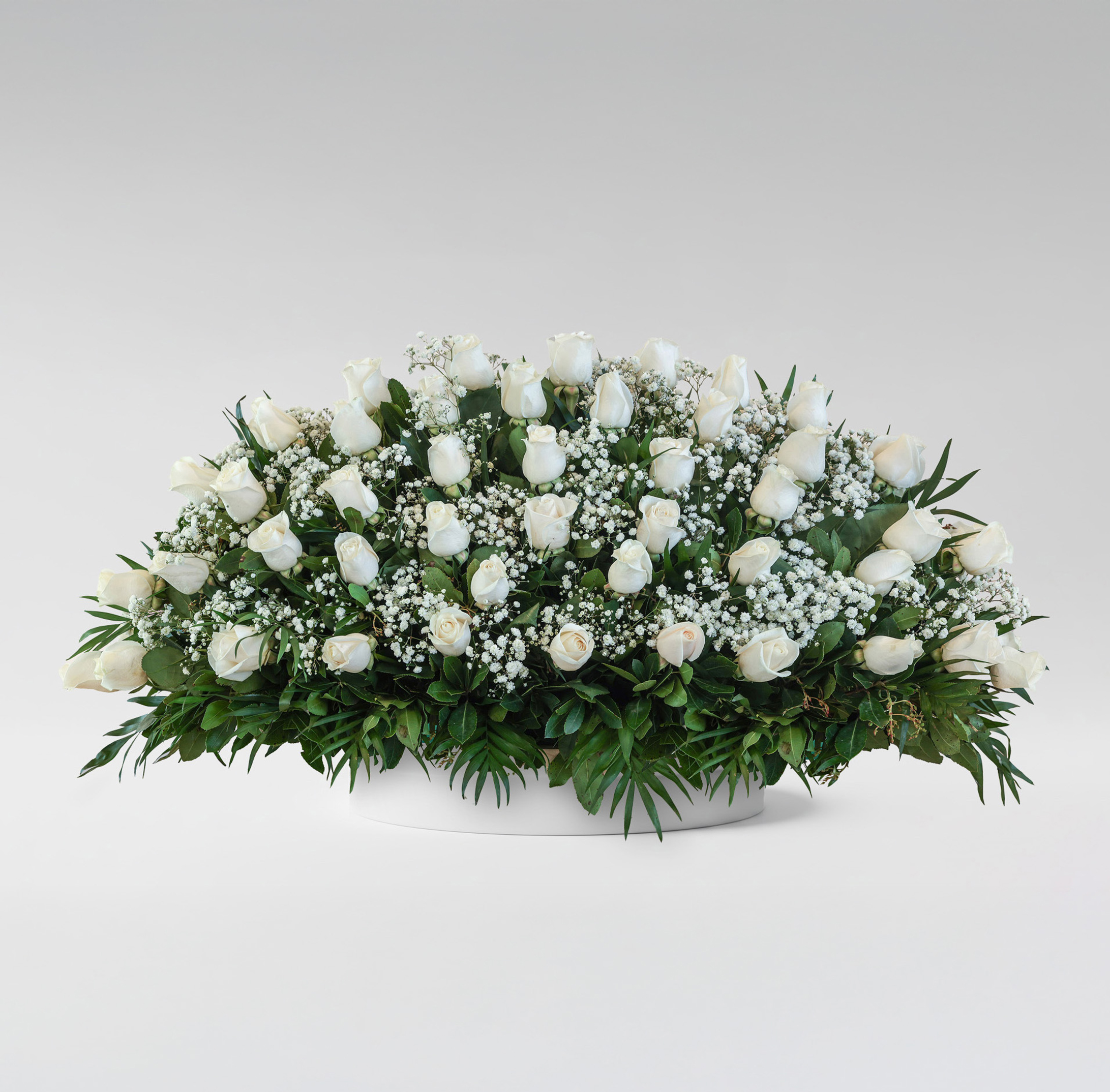 Centro de rosas blancas premium