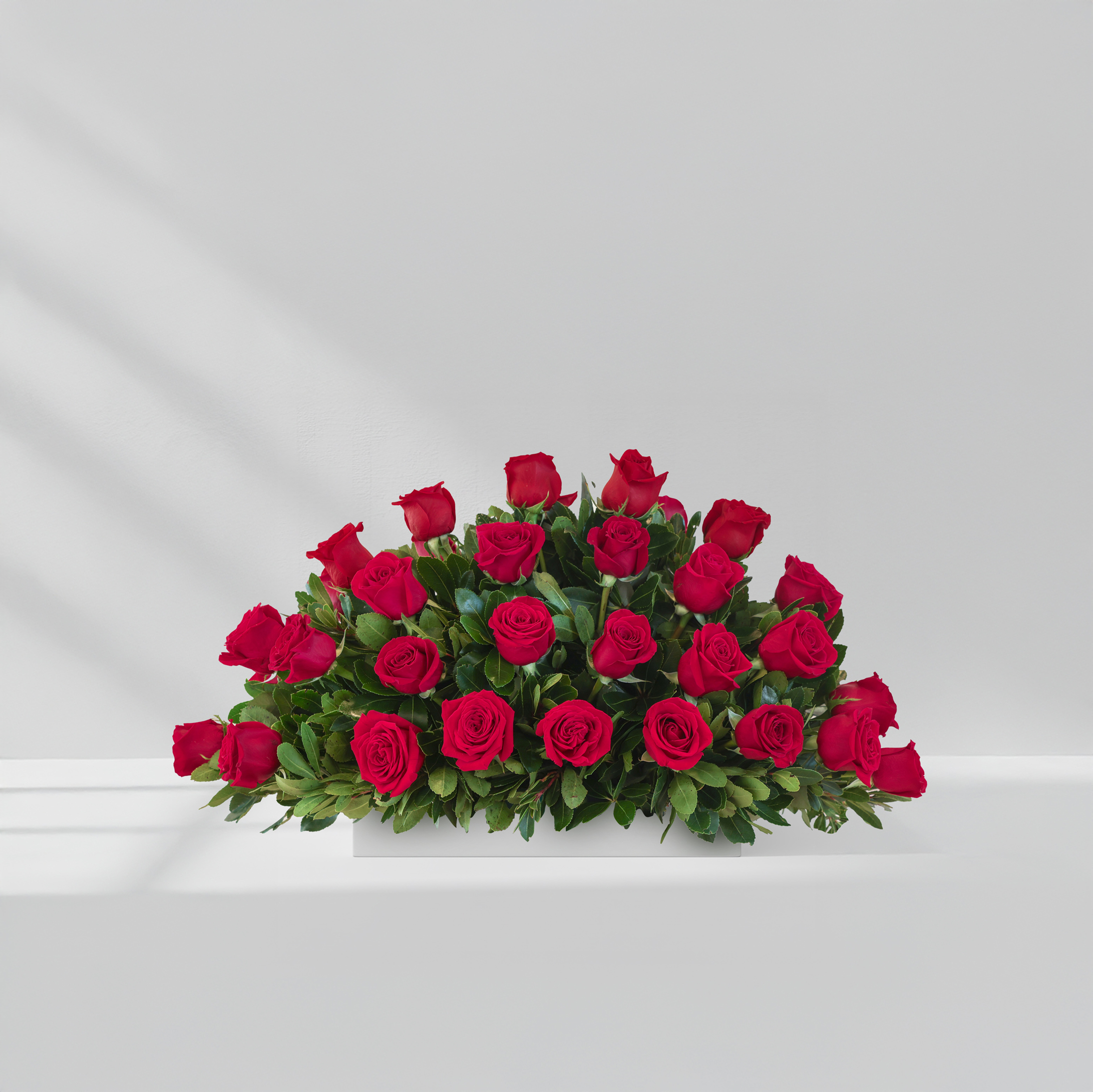 Centro de rosas rojas medium