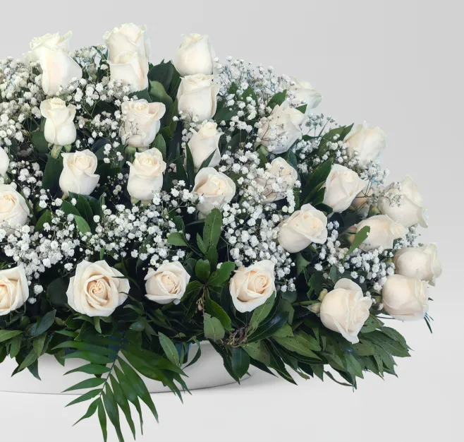 Centro de rosas blancas medium